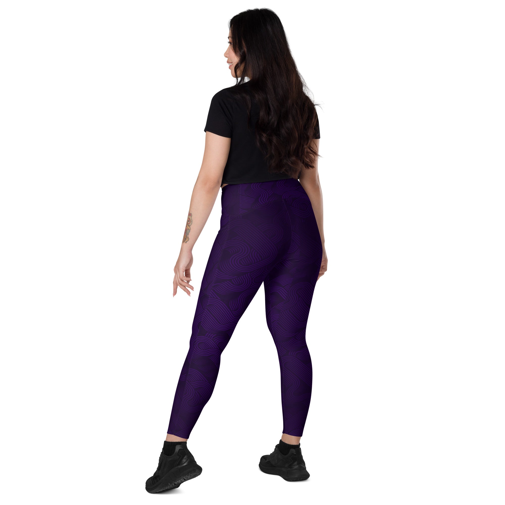 Midnight Sculpt Pocket Leggings – Crossover Edition worn by a woman from behind, showcasing the crossover waistband design.