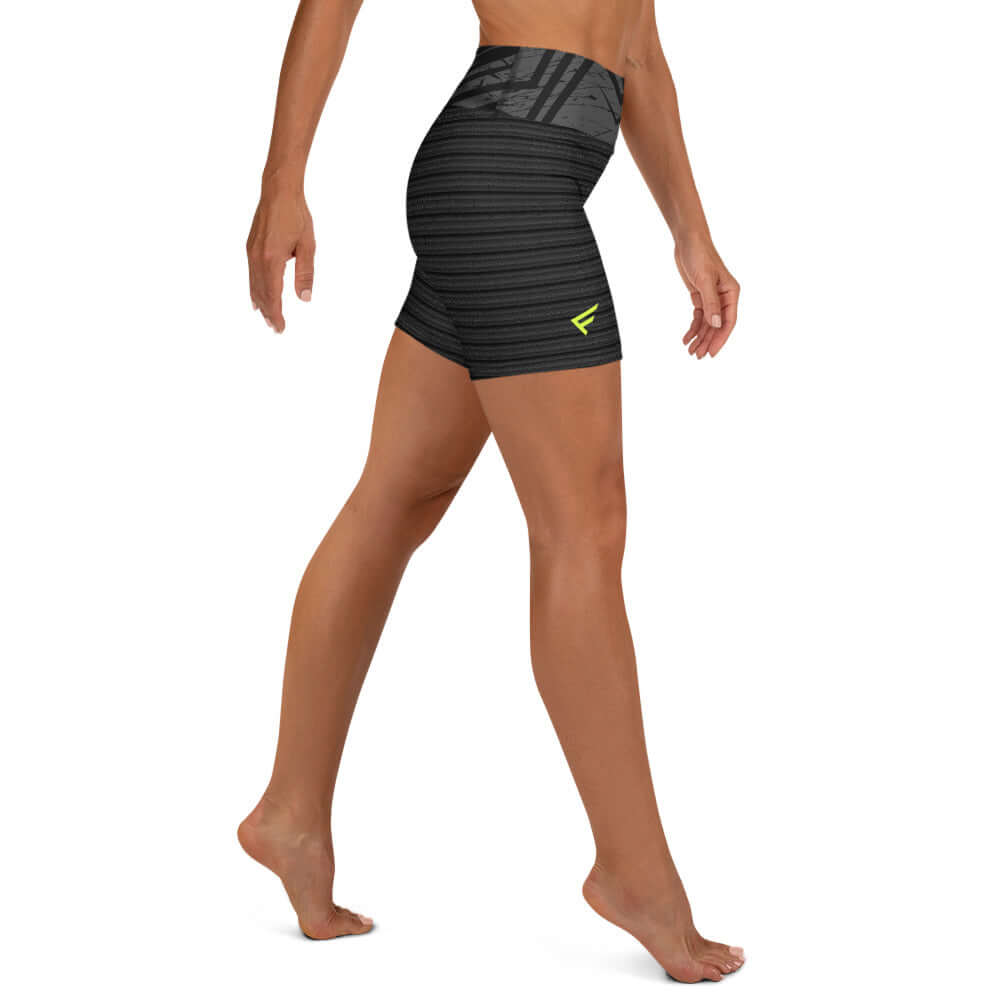 Women’s ribbed high-waisted shorts in black, showcasing textured design and smooth stretch fabric for active wear.