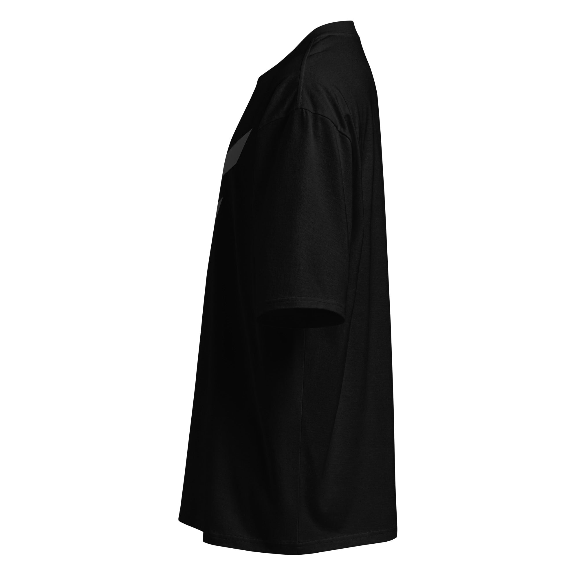 StreetCore Oversized Drop Shoulder Fit black oversized tee side view showcasing drop shoulders and relaxed fit.