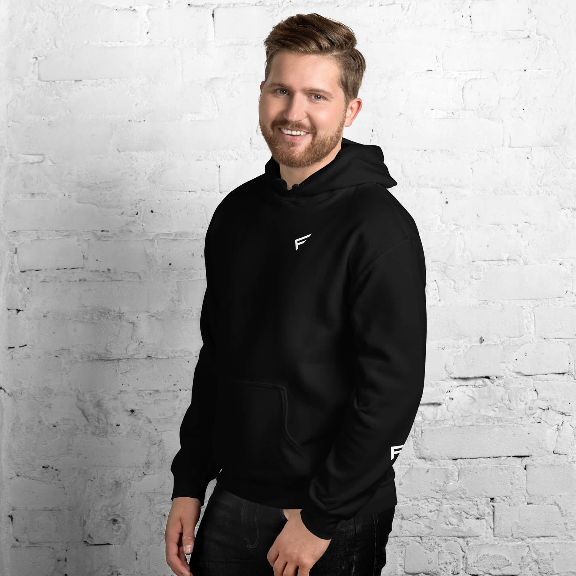 Men's black hoodie from Core Collection, showcasing comfort and style, perfect for everyday wear.
